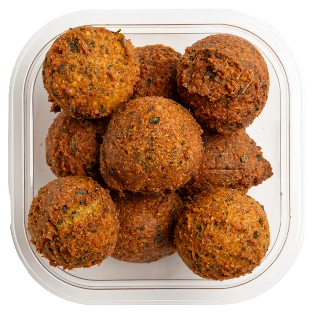 A clear plastic container holds nine golden-brown falafel balls, evenly arranged. The crispy texture and visible green herbs hint at the delicious Mediterranean flavors you'd find in restaurants near me. Viewed from above, the round shape and appetizing appearance are truly enticing.